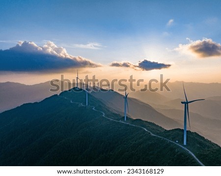 Beautiful sunset and wind power on the top of the mountain