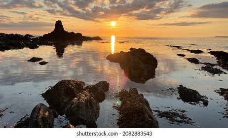 Beautiful Sunset At Yarmer Beach In South Devon, UK