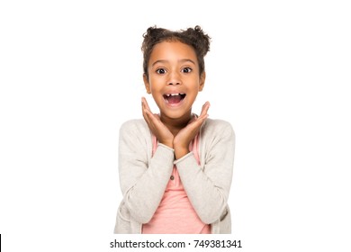 beautiful surprised african american child smiling at camera isolated on white