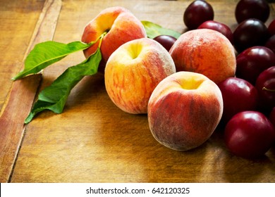 Beautiful Sweet Peaches And Plums.