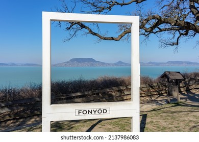 Beautiful Szaplonczay Promenade With Lake Balaton Landscape In Fonyód Hungary With Badacsony Hill In White Photo Frame With Fonyod Sign 