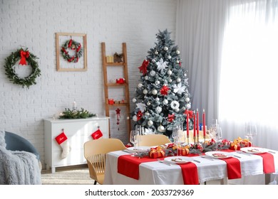 Beautiful Table Setting With Christmas Decorations In Living Room