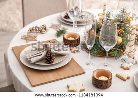 Beautiful table setting for Christmas dinner