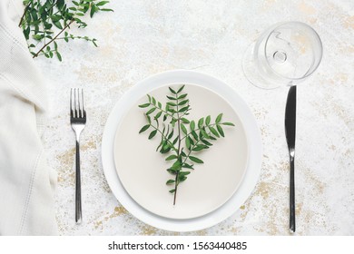Beautiful table setting with eucalyptus on white background - Shutterstock ID 1563440485