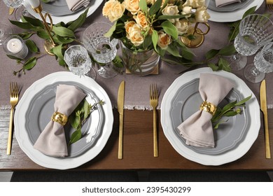 Beautiful table setting with floral decor, flat lay - Powered by Shutterstock