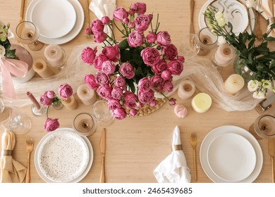 Beautiful table setting with flowers and candles for wedding celebration in room, top view - Powered by Shutterstock