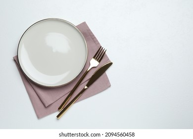 Beautiful table setting on white background, flat lay. Space for text - Powered by Shutterstock