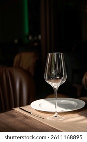                                Beautiful table setting in a restaurant with rays of sunshine