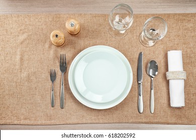 Beautiful table setting with white plates - Powered by Shutterstock