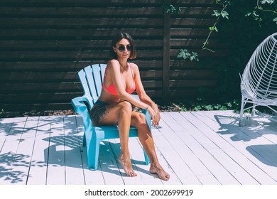 Beautiful Tanned Fit Slender Woman In Bikini In Backyard  Posing On Chair, Summer Vibes