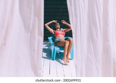 Beautiful Tanned Fit Slender Woman In Bikini In Backyard  Posing On Chair, Summer Vibes