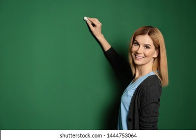 Beautiful Teacher Writing On Chalkboard, Space For Text