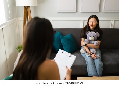 Beautiful Teen Girl Hugging A Teddy Bear And Recovering From Depression While On A Therapy Session