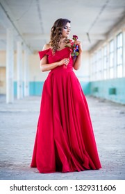 Beautiful Teen Girl In Long, Glamorous Red Dress Going To Her Prom Or Dance