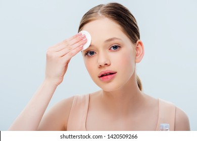 Beautiful Teenage Cleansing Face With Cotton Pad Isolated On Grey