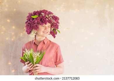 beautiful teenager girl with lilac and lily of valey