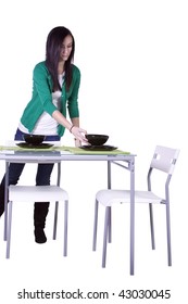 Beautiful Teenager Preparing The Dinner Table - Isolated