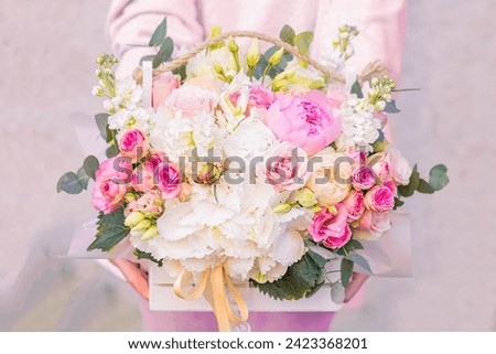 Similar – Image, Stock Photo Hold a bouquet of flowers in hand