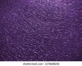 beautiful texture emboss blurred background of close up foam sheet in dark pruple color, plastic foam sheet background dark violet color, focus and blurred texture background dark purple colors