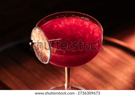 Beautiful texture on a cosmopolitan using reg edible glitter and and a dehydrated lime wheel