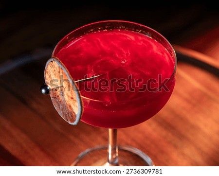 Beautiful texture on a cosmopolitan using reg edible glitter and and a dehydrated lime wheel