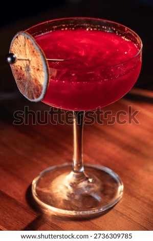 Beautiful texture on a cosmopolitan using reg edible glitter and and a dehydrated lime wheel