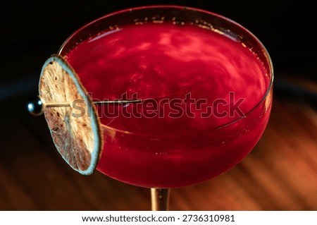 Beautiful texture on a cosmopolitan using reg edible glitter and and a dehydrated lime wheel
