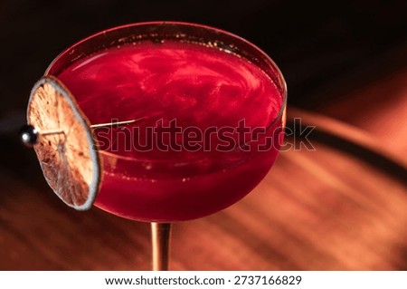 Beautiful texture on a cosmopolitan using reg edible glitter and and a dehydrated lime wheel