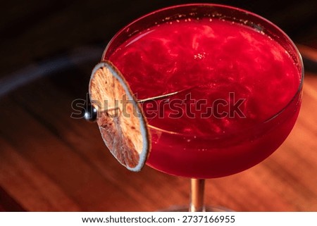 Beautiful texture on a cosmopolitan using reg edible glitter and and a dehydrated lime wheel