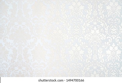 Beautiful Texture Of Paper Wallpaper Embossed In Form Of A Classic Floral Ornament In Light Golden Beige And White Tones.