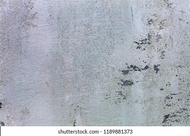 Beautiful Texture Of The Pattern Of Grind Gray Concrete With Black Impregnations On The Wall