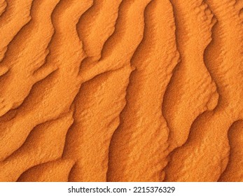 The Beautiful Texture Of Red Desert Sand