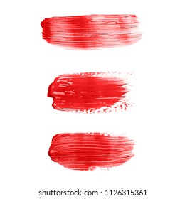 Beautiful textured red strokes of liquid lipstick or lip gloss, isolated on white background.
