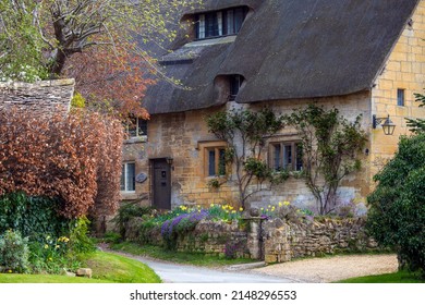 A Beautiful Thatched Cottage In The Cotswold Village Of Stanton In Gloucestershire, UK.