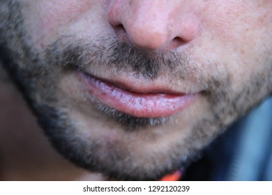 Beautiful Thin Men's Lips And Light Unshaven Face Close Up