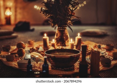 beautiful tibetan bowl and candles, ceremonial space. - Shutterstock ID 2067894296