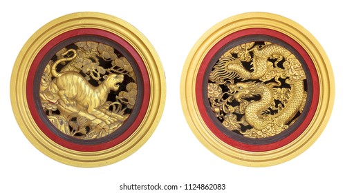 Beautiful Tiger and Dragon golden wood carving as circle window box at china tample.