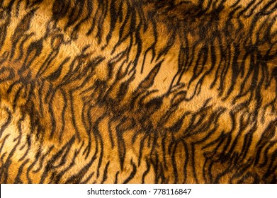 Beautiful Tiger Fur Pattern Texture Background.