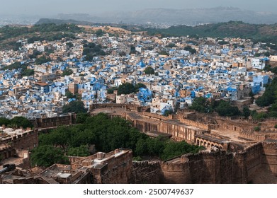 Beautiful top view of Jodhpur city from Mehrangarh fort, Rajasthan, India. Jodhpur is called Blue city since Hindu Brahmis there worship Lord Shiva, whose colour is blue, they painted houses in blue. - Powered by Shutterstock