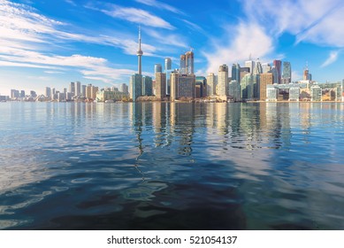 Beautiful Toronto Skyline With CN Tower Over Lake. Canada.