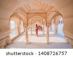 Beautiful Tourist wear Sali, traditional dress in Amber Palace, Jaipur, Rajasthan - India