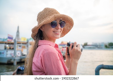 Beautiful Tourist Women With Camera Take Photo While Travel In Bangkok City Thailand