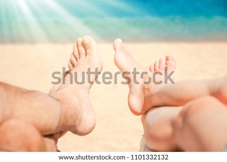 Beautiful traces with feet on sea nature background