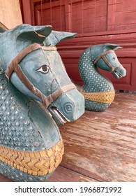 Beautiful Traditional Carved wood horse sculptures decorated in historical Thai house steps