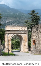 Beautiful Triumphal Arch of Augustus and Roman aqueduct in Susa, Torino, Italy, Europe, vertical