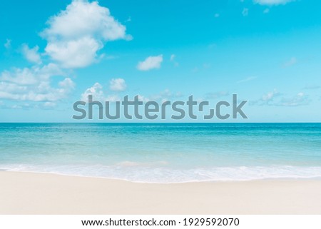 Beautiful tropical beach with blue sky and white clouds abstract texture background. Copy space of summer vacation and holiday business travel concept. Vintage tone filter effect color style.