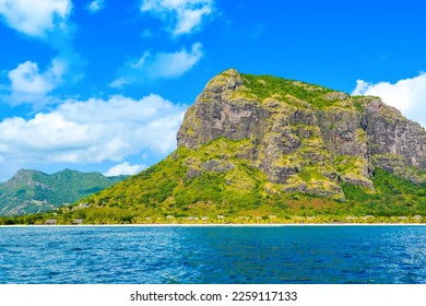 Beautiful tropical beach on the shore of Indian Ocean near Le Morne Brabant mountain, Mauritius - Shutterstock ID 2259117133