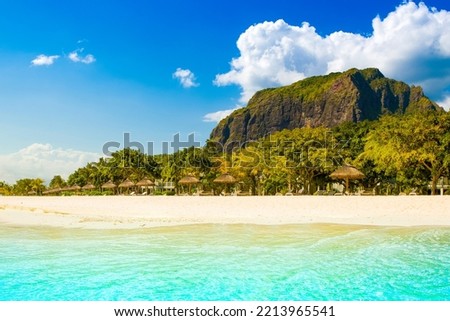 Beautiful tropical beach on the shore of Indian Ocean near Le Morne Brabant mountain, Mauritius