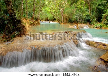 beautiful tropical landscape with cascades and streaming waterfalls 