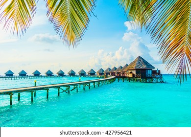 Beautiful tropical Maldives resort hotel and island with beach and sea on sky for holiday vacation background concept -Boost up color Processing